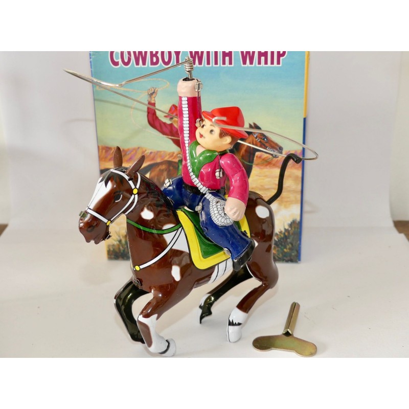JOUET EN TOLE MECANIQUE COWBOY WITH WHIP FOUET ET CLÃ‰