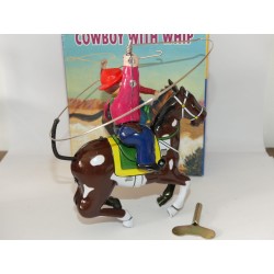 JOUET EN TOLE MECANIQUE COWBOY WITH WHIP FOUET ET CLÃ‰